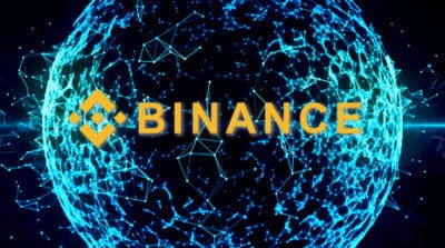 Binance Schriftzug mit elektronischer Kugel - Binance CEO CZ Binance Schriftzug mit elektronischer Kugel - Binance CEO CZ