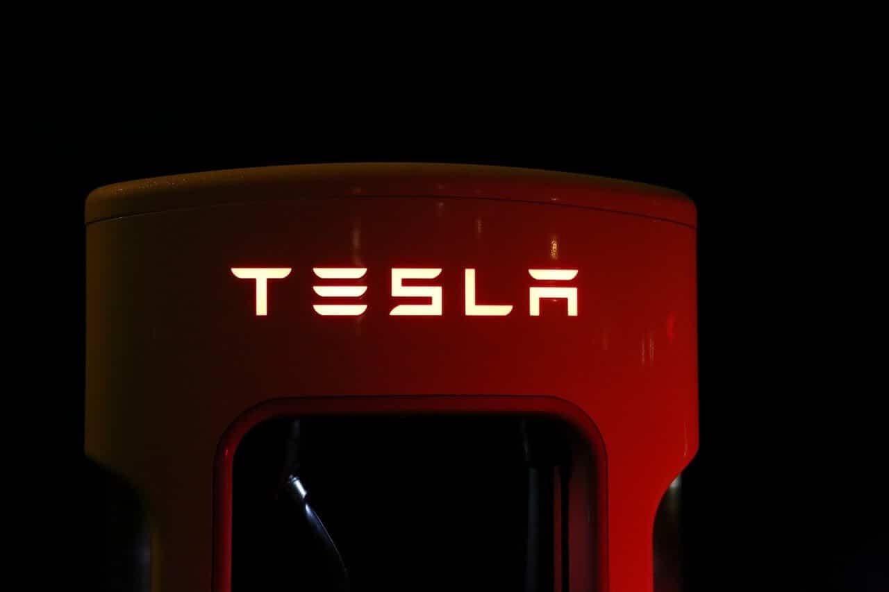 Tesla Logo Tesla CEO Elon Musk